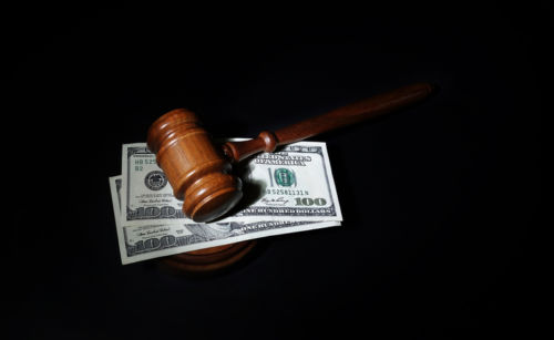 Gavel and Money representing Cost of Divorce - KM Family Law