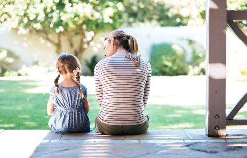 Photo of mom and young daughter on porch - Minnesota Parenting Plan - KM Family Law