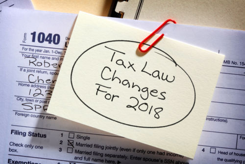 Tax Law Changes 2018 Sticky Note on Tax Form - KM Family Law